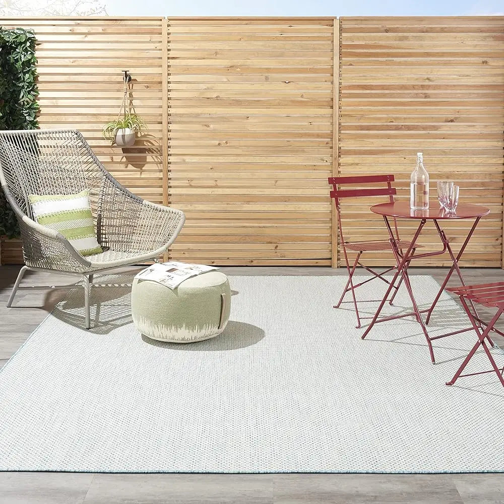 Indoor/Outdoor Ivory Aqua 7' X 10'