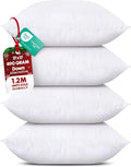 4 White Decorative Throw Pillows
